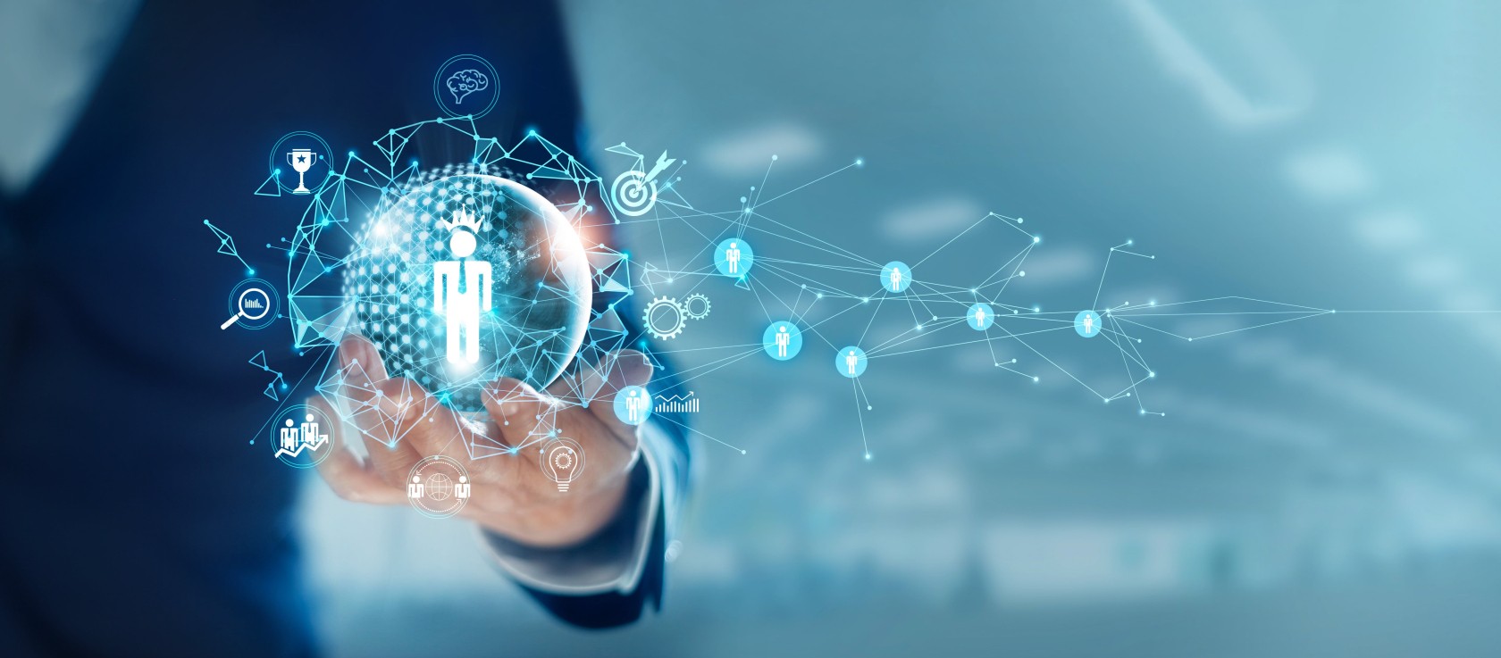 Man met bol in de hand met icoontjes, zakelijk